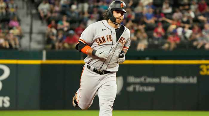 Jun 8, 2021; Arlington, Texas, USA; San Francisco Giants shortstop Brandon Crawford (35) circles the bases on his home run against the Texas Rangers during the sixth inning at Globe Life Field.